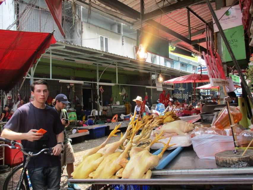 Bangkok Full-Day Bike Tour with Boat Transfer and Lunch - Crossing the Chao Phraya by longtail boat