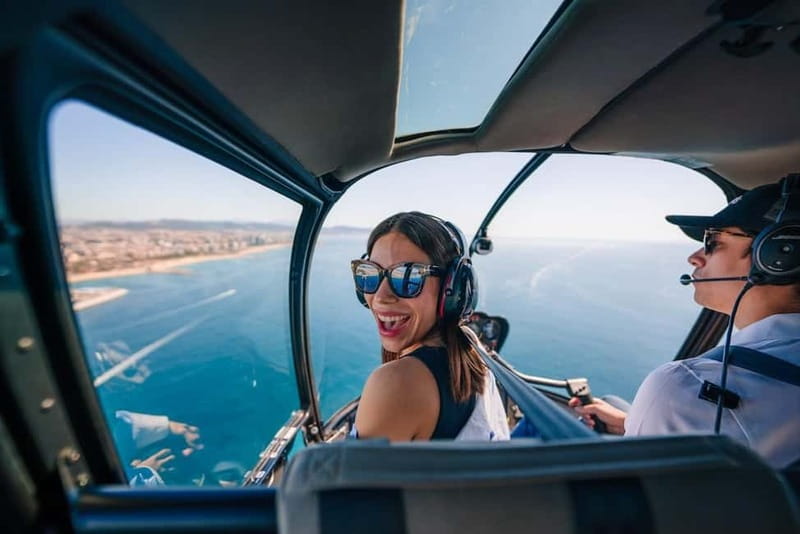 Barcelona: Helicopter Flight & Heliport Boat Transfer - Barcelona from the air, with the port beneath you