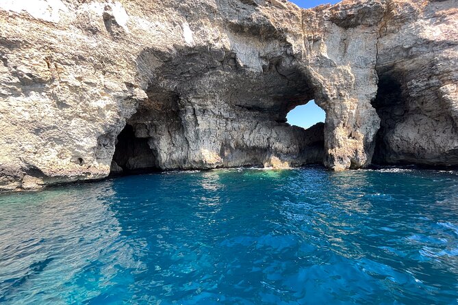 Blue Lagoon Ferry and Caves Tour - Crystal Lagoon Bay comes first on the return