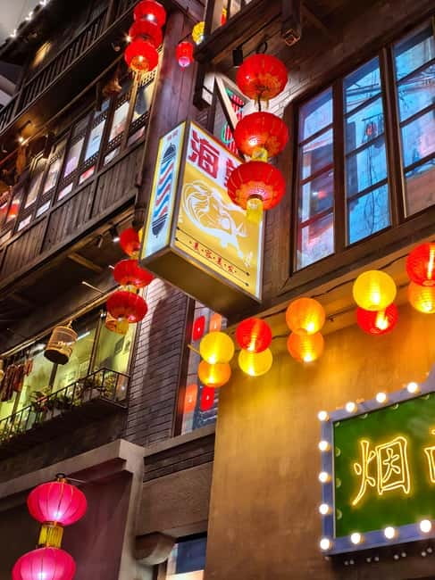 Chongqing: Trendy Spots, Cableway & Ferry Private Tour - Longmenhao Old Street and the city below