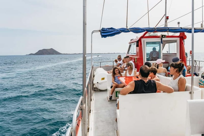 Desde Corralejo: Lobos Island Ferry with Optional Transfer - Snorkeling, fishing, surfing, or doing very little