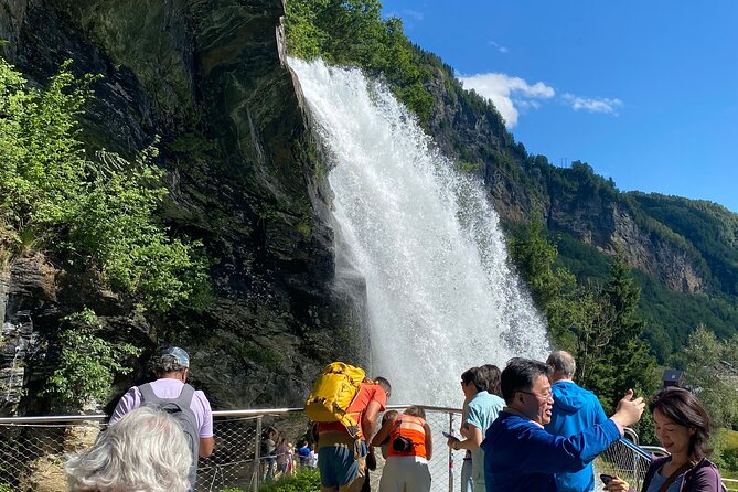 Guided tour to Hardanger Fjord, Waterfalls and Ferry Crossing - Walking behind Steinsdalsfossen