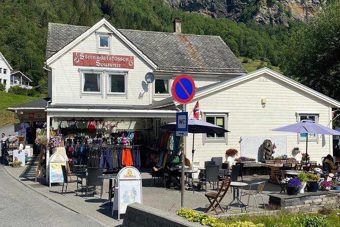 Guided tour to Hardanger Fjord, Waterfalls and Ferry Crossing - Utne brings old wooden Norway into view
