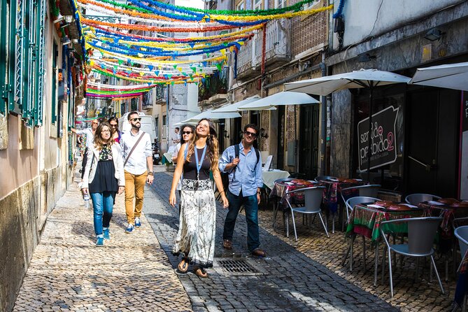 Lisbon Hidden Gems Walk: Traditions, Lunch and Ferry ride - Seafood rice, green wine, and a proper lunch