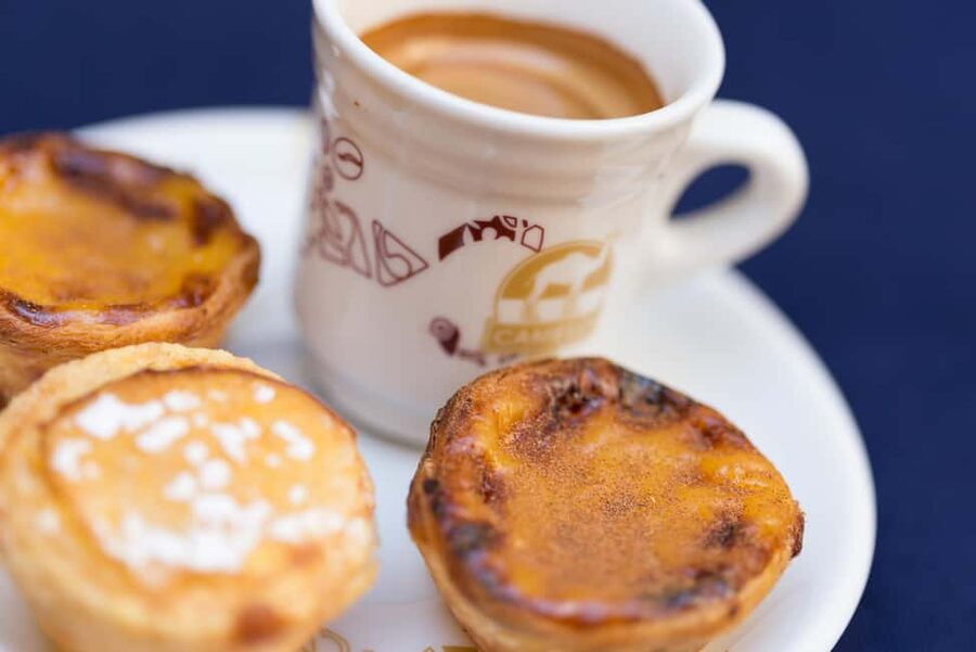 Lisbon Hidden Gems Walk: Traditions, Lunch & Ferry Ride - Starting at Hotel Mundial and entering Mouraria