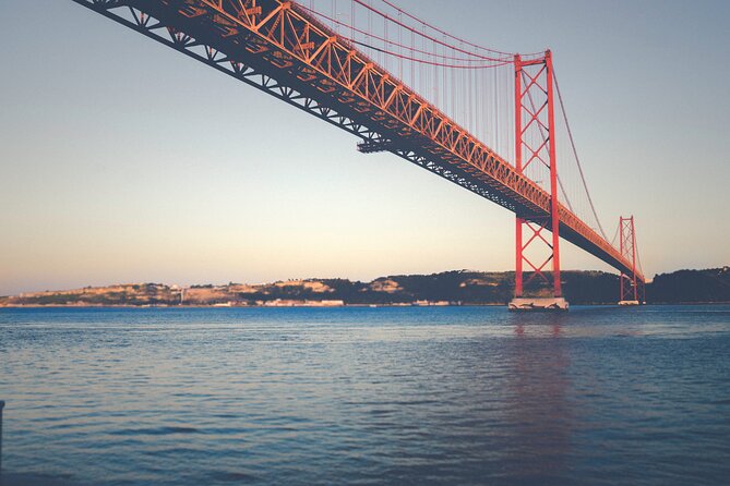 Lisbon Private City Tour with a River Boat Crossing Included - Christ the King offers Lisbon from across the Tagus