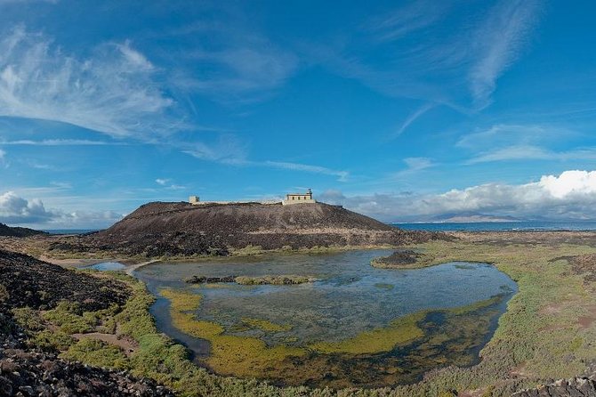 Lobos Island Ferry with Snorkel from Corralejo, Fuerteventura - El Puertito, salt marshes, and Faro Martiño