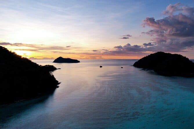 Phi Phi Islands Adventure: Ferry, Snorkeling & Island Lunch - Viking Cave beneath the cliff
