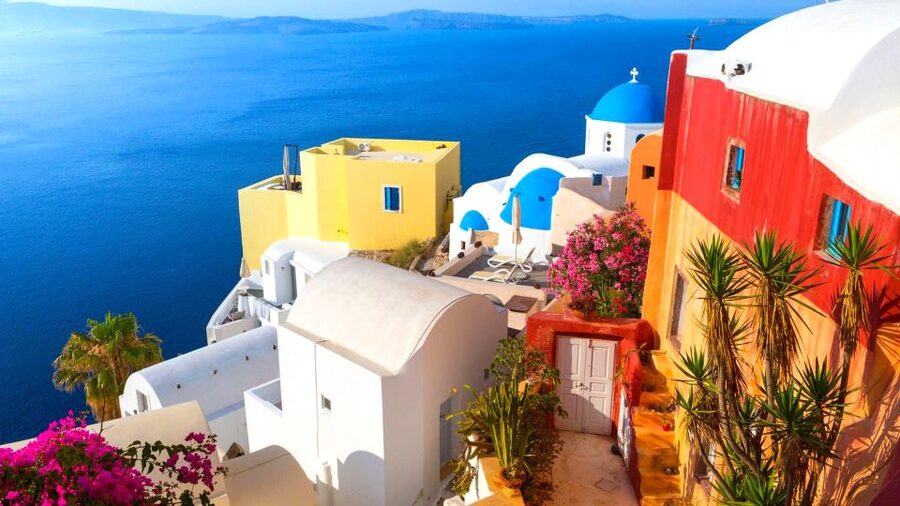 Santorini Guided Day Trip From Crete with Ferry Tickets - First stop, Oia and the famous blue domes
